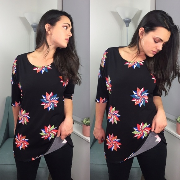LuLaRoe Tops - LulaRoe Black Pinwheel Irma Top
